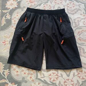 Black Women’s Biking  Shorts with Orange Accents, padding  and 4 zip pockets